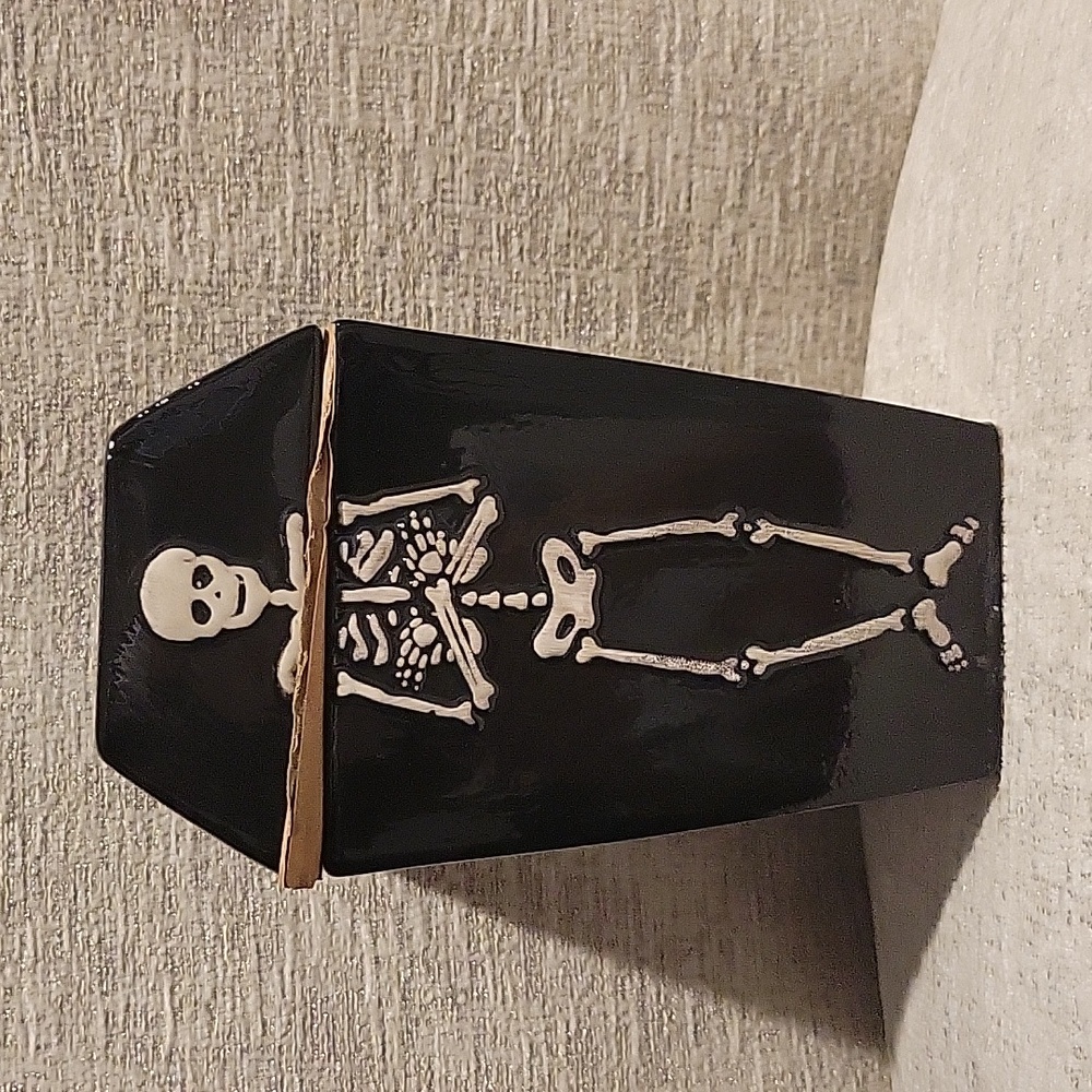 Skeleton candy jar. 4.29" x 3.86" x 7.24".  New
